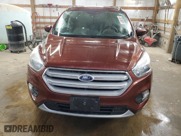 2018 Ford Escape SE z VIN 1FMCU9GD2JUA21582, wystawiony jako Copart lot #56165155 z przebiegiem 88 881 mil mil oraz Czysty tytuł • Clean title. Historia ofert i sprzedaży dostępna na DreamBid. Obrazek 5.