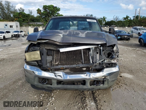 2002 Ford F-250 XL with VIN 1FTNW20F12EB93947, listed as a Copart auction lot 77836054 with 322,030 mi miles and Salvage Title. Bid and sale history available at DreamBid. Image 5.