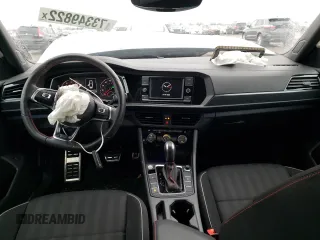2021 Volkswagen Jetta GLI S z VIN 3VW6T7BU1MM017433, wystawiony jako Copart lot #73349822 z przebiegiem 7188 mil mil oraz . Historia ofert i sprzedaży dostępna na DreamBid. Obrazek 8.