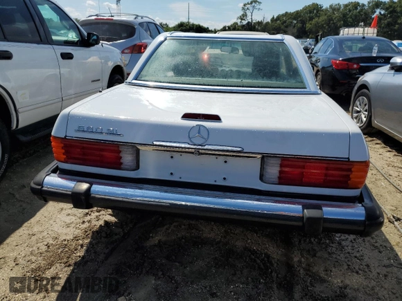 1989 Mercedes-Benz 560 SL z VIN WDBBA48D0KA098625, wystawiony jako Copart lot #73863784 z przebiegiem 30 648 mil mil oraz Szkoda całkowita • Salvage title. Historia ofert i sprzedaży dostępna na DreamBid. Obrazek 6.