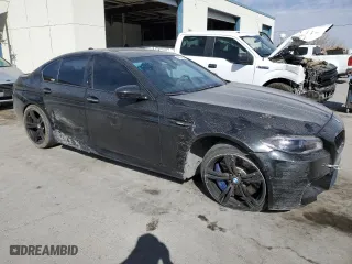 2015 BMW M5 with VIN WBSFV9C5XFD595148, listed as a Copart auction lot 46157335 with 77,582 mi miles and Salvage Title. Bid and sale history available at carsss.com. Image 4.