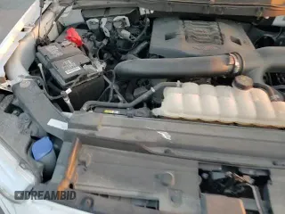 2021 Ford F-150 XL z VIN 1FTEW1C89MKE55077, wystawiony jako Copart lot #51331265 z przebiegiem 32 936 mil mil oraz Szkoda całkowita • Salvage title. Historia ofert i sprzedaży dostępna na DreamBid. Obrazek 13.