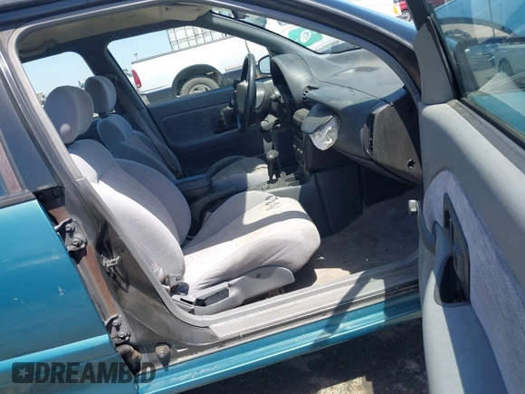 1995 Saturn SL with VIN 1G8ZK5275SZ303745, listed as a IAAI auction lot 42280801 with 137,719 mi miles and . Bid and sale history available at DreamBid. Image 5.