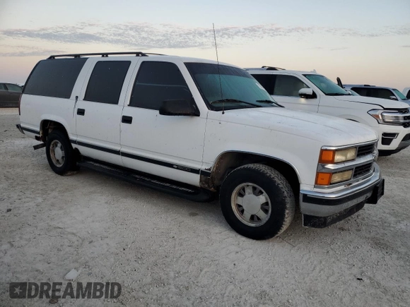 1999 Chevrolet Suburban with VIN 3GNEC16R3XG247177, listed as a Copart auction lot 75674564 with 132,546 mi miles and Non Repairable. Bid and sale history available at carsss.com. Image 4.