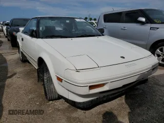 1986 Toyota MR2 z VIN JT2AW15C7G0083196, wystawiony jako Copart lot #74149374 z przebiegiem 30 771 mil mil oraz Nie do naprawy. Historia ofert i sprzedaży dostępna na DreamBid. Obrazek 5.