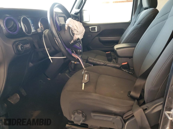 2021 Jeep Wrangler Unlimited Sport S with VIN 1C4HJXDG3MW544043, listed as a Copart auction lot 56559015 with 84,344 mi miles and Salvage title. Bid and sale history available at DreamBid. Image 7.