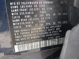 2012 Volkswagen Tiguan S with VIN WVGBV7AX3CW571039, listed as a IAAI auction lot 41928361 with 165,938 mi miles and . Bid and sale history available at DreamBid. Image 9.