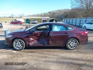 2013 Ford Fusion SE z VIN 3FA6P0H71DR198090, wystawiony jako IAAI lot #41211029 z przebiegiem 60 726 mil mil oraz . Historia ofert i sprzedaży dostępna na DreamBid. Obrazek 14.