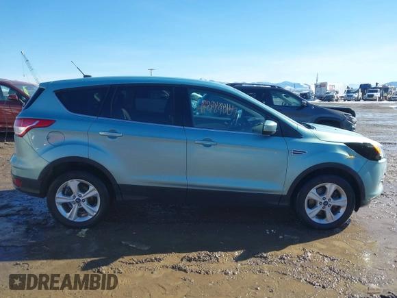 2013 Ford Escape SE z VIN 1FMCU9GX3DUC55471, wystawiony jako IAAI lot #41484007 z przebiegiem 174 381 mil mil oraz . Historia ofert i sprzedaży dostępna na DreamBid. Obrazek 13.