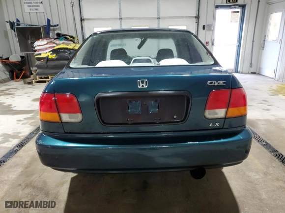 1997 Honda Civic LX with VIN 1HGEJ6572VL027980, listed as a Copart auction lot 53024335 with 269,396 mi miles and Salvage Title. Bid and sale history available at carsss.com. Image 6.