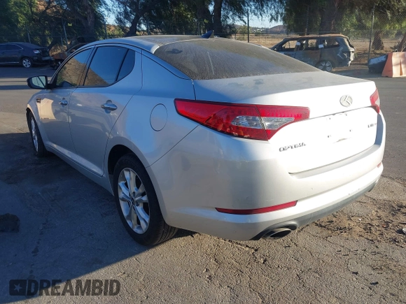 2012 Kia Optima EX with VIN 5XXGN4A67CG071208, listed as a IAAI auction lot 41302757 with 99,209 mi miles and . Bid and sale history available at carsss.com. Image 3.