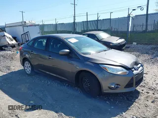 2012 Ford Focus SE with VIN 1FAHP3F27CL276208, listed as a IAAI auction lot 41995770 with 98,004 mi miles. Bid and sale history available at carsss.com. Image 1.