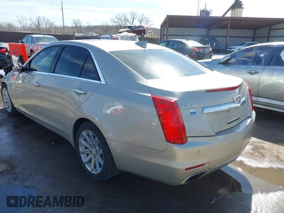 2016 Cadillac CTS Sedan Luxury Collection RWD with VIN 1G6AR5SX5G0114297, listed as a IAAI auction lot 38878385 with 60,611 mi miles. Bid and sale history available at carsss.com. Image 3.