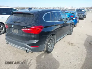 2016 BMW X1 xDrive28i with VIN WBXHT3Z3XG4A48557, listed as a IAAI auction lot 41387960 with 84,821 mi miles. Bid and sale history available at carsss.com. Image 4.
