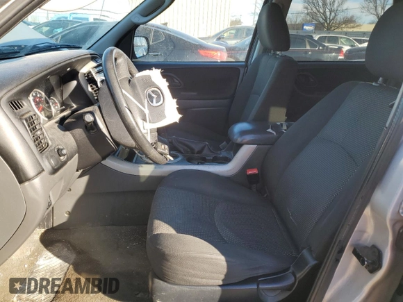 2006 Mazda Tribute S with VIN 4F2YZ04166KM17017, listed as a Copart auction lot 42969365 with 217,984 mi miles and Salvage Title. Bid and sale history available at DreamBid. Image 7.