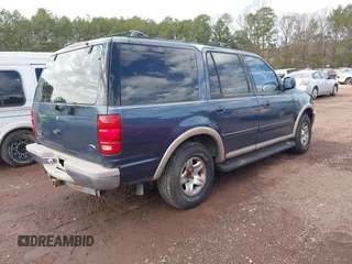 1998 Ford Expedition XLT with VIN 1FMRU17L1WLA99979, listed as a IAAI auction lot 41569667 with 215,937 mi miles. Bid and sale history available at carsss.com. Image 4.