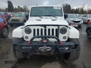 2015 Jeep Wrangler Unlimited Rubicon Hard Rock with VIN 1C4HJWFG8FL647910, listed as a Copart auction lot 46716605 with 48,139 mi miles and Salvage Title. Bid and sale history available at carsss.com. Image 5.