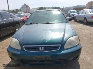 1999 Honda Civic VP with VIN 2HGEJ6619XH509582, listed as a IAAI auction lot 41774443 with 231,357 mi miles. Bid and sale history available at carsss.com. Image 6.