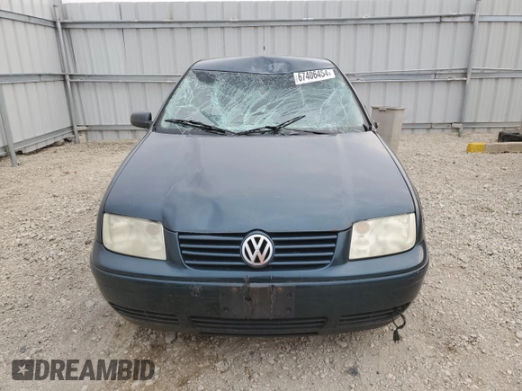 2002 Volkswagen Jetta с VIN 3VWSB29M42M068867, выставлен на аукционе Copart как лот 67406454 с пробегом 214 613 миль миль и Списание • Salvage title. История ставок и продаж доступна на DreamBid. Изображение 5.