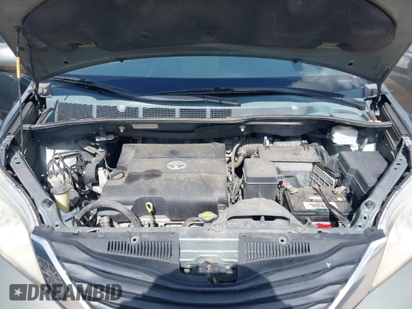2014 Toyota Sienna XLE with VIN 5TDYK3DC2ES448876, listed as a IAAI auction lot 42519351 with 154,601 mi miles and . Bid and sale history available at DreamBid. Image 10.