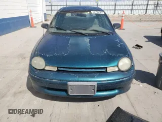 1995 Plymouth Neon z VIN 3P3ES47C4ST544935, wystawiony jako Copart lot #52709525 z przebiegiem 111 566 mil mil oraz Tytuł czysty. Historia ofert i sprzedaży dostępna na DreamBid. Obrazek 5.