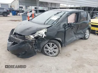 2009 Honda Fit Sport with VIN JHMGE88499S027610, listed as a IAAI auction lot 41712904 with 147,069 mi miles. Bid and sale history available at carsss.com. Image 17.