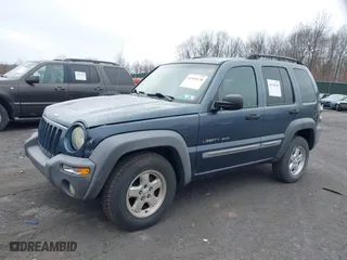 2002 Jeep Liberty Sport with VIN 1J8GL48K62W298212, listed as a IAAI auction lot 41918130 with 226,299 mi miles. Bid and sale history available at carsss.com. Image 2.