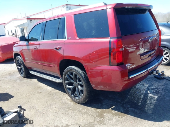 2016 Chevrolet Tahoe LTZ with VIN 1GNSKCKC9GR422695, listed as a IAAI auction lot 41880564 with 302,106 mi miles. Bid and sale history available at carsss.com. Image 3.