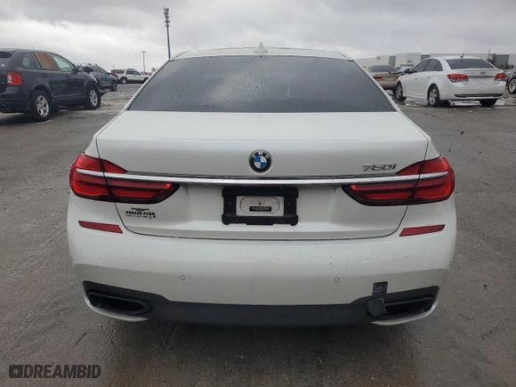 2017 BMW 7 Series 750i with VIN WBA7F0C34HGM21478, listed as a Copart auction lot 48116435 with 76,617 mi miles and Salvage Title. Bid and sale history available at carsss.com. Image 6.