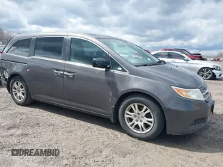 2013 Honda Odyssey EX z VIN 5FNRL5H40DB068597, wystawiony jako IAAI lot #41910524 z przebiegiem 164 991 mil mil oraz . Historia ofert i sprzedaży dostępna na DreamBid. Obrazek 1.