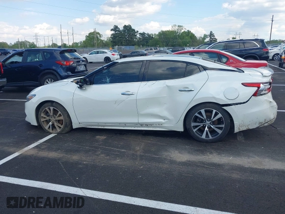 2018 Nissan Maxima S with VIN 1N4AA6AP7JC375048, listed as a IAAI auction lot 42001856 with 109,284 mi miles and . Bid and sale history available at DreamBid. Image 14.