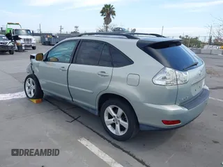 2004 Lexus RX 330 with VIN 2T2HA31U04C038483, listed as a IAAI auction lot 42025073 with 128,047 mi miles. Bid and sale history available at carsss.com. Image 3.