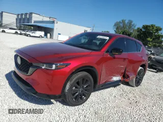 2022 Mazda CX-5 2.5 Turbo with VIN JM3KFBAY9N0560069, listed as a Copart auction lot 84155024 with 36,352 mi miles and Salvage Title. Bid and sale history available at carsss.com. Image 1.