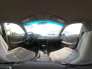 2001 Toyota Camry CE z VIN 4T1BG22KX1U767696, wystawiony jako IAAI lot #42271803 z przebiegiem 130 927 mil mil oraz . Historia ofert i sprzedaży dostępna na DreamBid. Obrazek 18.