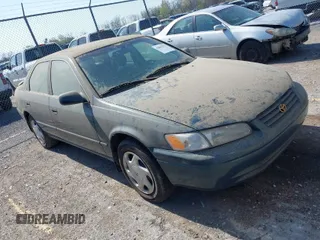 1997 Toyota Camry LE z VIN 4T1BF22KXVU037814, wystawiony jako IAAI lot #42043337 z przebiegiem 99 610 mil mil oraz . Historia ofert i sprzedaży dostępna na DreamBid. Obrazek 1.