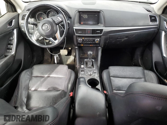 2016 Mazda CX-5 Grand Touring z VIN JM3KE4DY0G0633861, wystawiony jako Copart lot #47748645 z przebiegiem 112 219 mil mil oraz Szkoda całkowita • Salvage title. Historia ofert i sprzedaży dostępna na DreamBid. Obrazek 8.