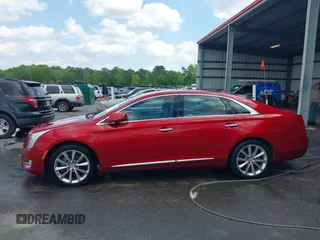 2013 Cadillac XTS Premium with VIN 2G61S5S34D9237236, listed as a IAAI auction lot 41994164 with 218,719 mi miles. Bid and sale history available at carsss.com. Image 14.