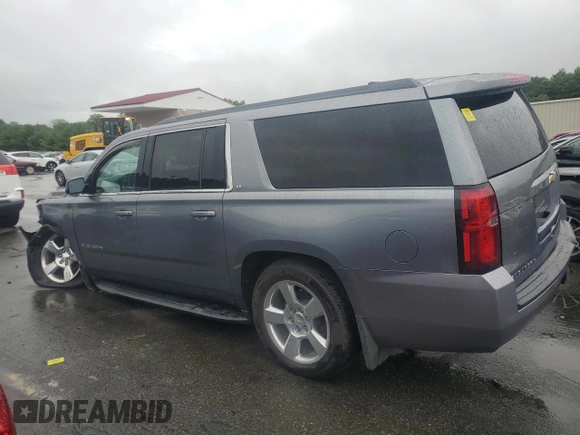 2020 Chevrolet Suburban LT with VIN 1GNSKHKC8LR149112, listed as a Copart auction lot 64085105 with 110,445 mi miles and Salvage title. Bid and sale history available at DreamBid. Image 2.