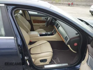 2015 Jaguar XF V6 Portfolio with VIN SAJWJ0FF5F8U67140, listed as a IAAI auction lot 41967522 with 68,000 mi miles. Bid and sale history available at carsss.com. Image 5.