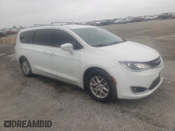 2020 Chrysler Pacifica Touring L with VIN 2C4RC1BG5LR131028, listed as a Copart auction lot 56505555 with 102,972 mi miles and Salvage title. Bid and sale history available at DreamBid. Image 4.