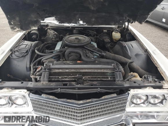 1974 Cadillac Eldorado z VIN 6L67S4Q408046, wystawiony jako Copart lot #77112024 z przebiegiem 97 414 mil mil oraz Szkoda całkowita • Salvage title. Historia ofert i sprzedaży dostępna na DreamBid. Obrazek 11.