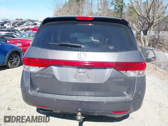 2014 Honda Odyssey Touring with VIN 5FNRL5H92EB016546, listed as a IAAI auction lot 41689148 with 143,601 mi miles and . Bid and sale history available at DreamBid. Image 16.
