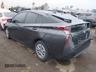 2018 Toyota Prius Two with VIN JTDKBRFUXJ3591956, listed as a IAAI auction lot 41848336 with 62,560 mi miles and . Bid and sale history available at DreamBid. Image 3.