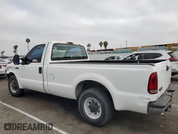 2000 Ford Super Duty F-250 XL with VIN 1FTNF20SXYEE41859, listed as a Copart auction lot 59682704 with 190,234 mi miles and Salvage Title. Bid and sale history available at carsss.com. Image 2.