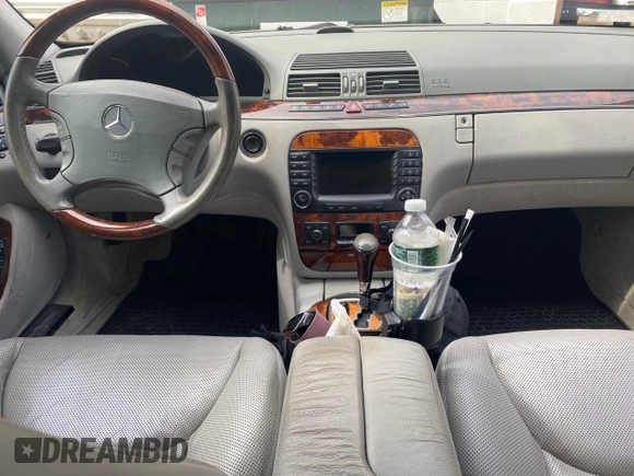 2005 Mercedes-Benz S-Class 5.0L with VIN WDBNG75J35A460118, listed as a Copart auction lot 77103084 with 99,573 mi miles and Clean Title. Bid and sale history available at carsss.com. Image 9.