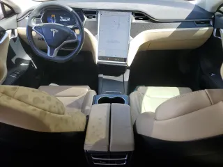 2017 Tesla Model S 60 with VIN 5YJSA1E13HF190581, listed as a Copart auction lot 57383595 with 88,219 mi miles and Salvage title. Bid and sale history available at DreamBid. Image 8.