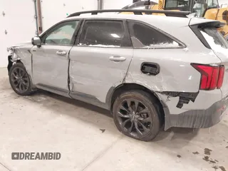 2023 Kia Sorento SX z VIN 5XYRKDLF0PG189570, wystawiony jako IAAI lot #41587404 z przebiegiem 22 006 mil mil oraz . Historia ofert i sprzedaży dostępna na DreamBid. Obrazek 6.