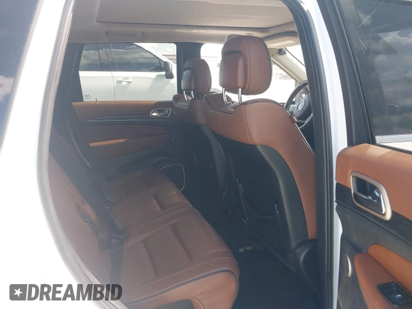 2015 Jeep Grand Cherokee Summit with VIN 1C4RJEJG5FC105038, listed as a IAAI auction lot 42555024 with 133,077 mi miles and . Bid and sale history available at DreamBid. Image 8.