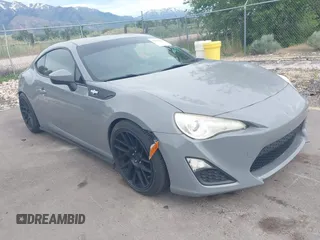 2013 Scion FR-S z VIN JF1ZNAA10D2701174, wystawiony jako IAAI lot #42344351 z przebiegiem 177 027 mil mil oraz . Historia ofert i sprzedaży dostępna na DreamBid. Obrazek 1.