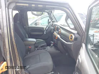 2019 Jeep Wrangler Unlimited Sport S with VIN 1C4HJXDN4KW577273, listed as a IAAI auction lot 42435847 with 69,403 mi miles and . Bid and sale history available at DreamBid. Image 5.